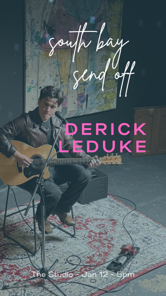 Derick Leduke performing on guitar