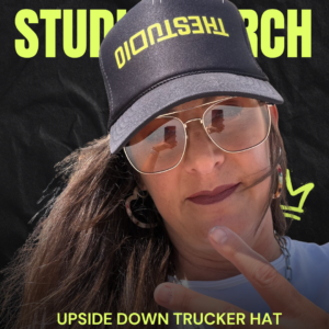 Black trucker hat with neon yellow upside down logo print