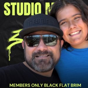 Members Only Black hat with black embroidery that spells "The Studio"